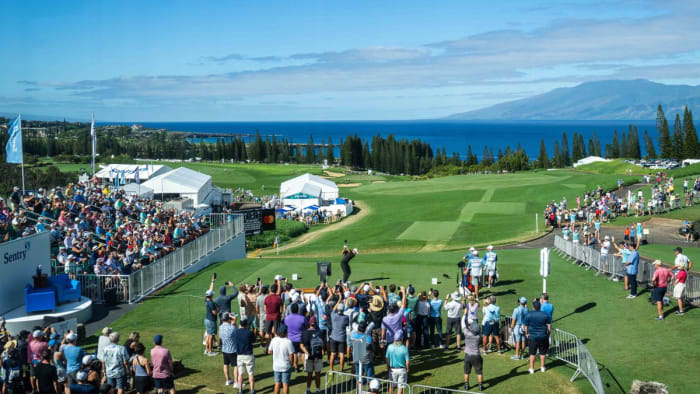 Collin Morikawa tees off on the first hole during the final round of the 2023 Sentry Tournament of Champions on The Plantation Course at Kapalua Lahaina, Maui, Hawaii.